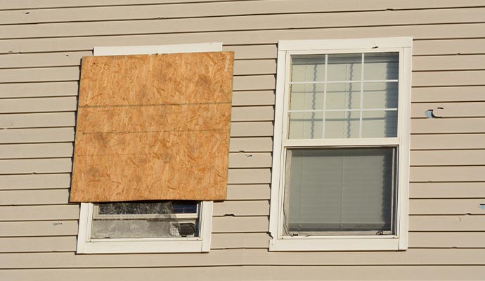 hail damage siding home window boardup service