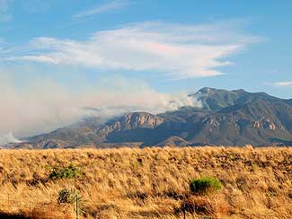 Wild fires along mountain ridge.