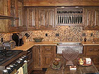 Kitchen with dark brown wood cabinets.